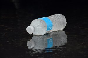 A labeled bottle of water