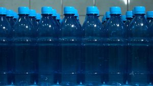 Rows of branded bottled water